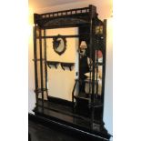 A LARGE VICTORIAN AESTHETIC MOVEMENT MIRROR With spindle gallery above floral painted panels, open