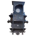 A 19TH CENTURY MOORISH DESIGN EBONISED AND MOTHER OF PEARL INLAID OPEN SHELVES With central