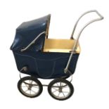 TRI-ANG, A VINTAGE DOLLS PRAM With rexsin hood, blue steel body and spoked wheels. (66cm x 66cm)