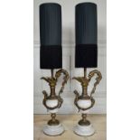 A LARGE PAIR OF DECORATIVE BRONZE AND CHINA LAMPS In the form of ewers with dragon handles and