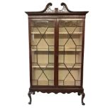 AN 18TH CENTURY AND LATER MAHOGANY DISPLAY CABINET The pierced swan neck pediment above two astragal