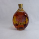 A VINTAGE 1LT BOTTLE OF HAIG DIMPLE WHISKY Having a sealed cap, the collar label marked 86% NS