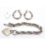 A CONTEMPORARY SILVER BRACELET Having a T bar and heart form fob, together with a pair of silver