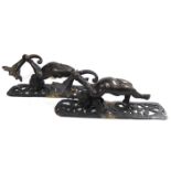 A PAIR OF 19TH CENTURY BRONZE DOOR PULLS In the form of putti holding cornucopia aloft, on pierced