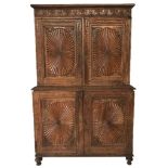 A 19TH CENTURY ANGLO-INDIAN CARVED PADOUK WOOD LINEN PRESS With two pairs of radiating gadrooned