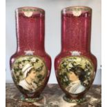 ATTRIBUTED TO MOSER, A PAIR OF LATE 19TH CENTURY CRANBERRY GLASS VASES Painted with female portraits