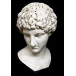 AN ANTIQUE WHITE MARBLE BUST OF ANTINOUS, POSSIBLY ROMAN Finely carved and having pitted and