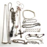 A COLLECTION OF SILVER JEWELLERY Comprising an Albert chain with T bar, an identity bracelet,