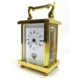 DAVID PETERSON, A CASED 20TH CENTURY GILT BRASS CARRIAGE CLOCK Having carry handle, four bevelled