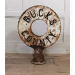 A VICTORIAN CAST IRON CIRCULAR BORDER ROAD SIGN Marked 'Bucks County', on a spherical base. (