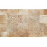 AN UNUSUAL PATCHWORK COWHIDE RUG With applied floral decoration, sold together with a large