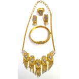 A BAHRAIN BICOLOUR YELLOW METAL AND WHITE GOLD NECKLACE, BRACELET, RING AND EARRING SUITE Rec