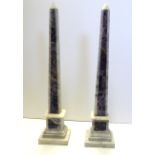 A PAIR OF ITALIAN AMETHYST AND WHITE MARBLE PYRAMID FORM OBELISKS On a square pedestal base. (approx