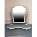 A PAINTED VICTORIAN TOILET MIRROR Having an arched top flanked by barley twist supports, raised on a