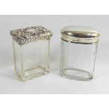 TWO EARLY 20TH CENTURY SILVER AND GLASS TRINKET BOTTLES Rectangular form with embossed decoration