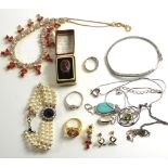 A COLLECTION OF VINTAGE COSTUME JEWELLERY A gem set necklace and matching dress ring, a simulated