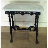 AN EARLY 20TH CENTURY CAST IRON TABLE