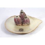 AN UNUSUAL SILVER, SHELL AND MOTHER OF PEARL INKSTAND The arrangement of shells with silver cap