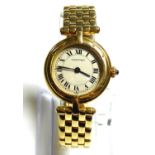 CARTIER, AN 18CT GOLD LADIES? WRISTWATCH Circular silver tone dial with black Roman number