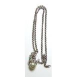 AN 18CT WHITE GOLD, DIAMOND, EMERALD AND PEARL PENDANT NECKLACE The single pearl held in a pierced