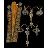 A PAIR OF 20TH CENTURY BRASS WALL SCONCES With floral framework and faceted lustre drops, together