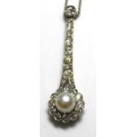 A PLATINUM NATURAL PEARL AND DIAMOND SET PENDENT The single pearl edged with diamonds on a