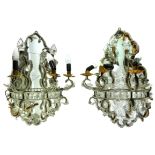 A PAIR OF VENETIAN THE BRANCH WALL SCONCES With ogee mirrored backs surrounded by glass beads and