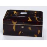 A VICTORIAN TORTOISESHELL AND IVORY BOX With sarcophagus top and blue lining. (approx 8cm x 5cm x