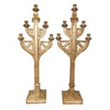 A LARGE PAIR OF 19TH CENTURY GOTHIC SILVERED GILT WOOD CANDLESTANDS With pierced arches and five