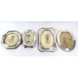 A COLLECTION OF FOUR EARLY 20TH CENTURY SILVER PHOTOGRAPH FRAMES Comprising two oval frames,
