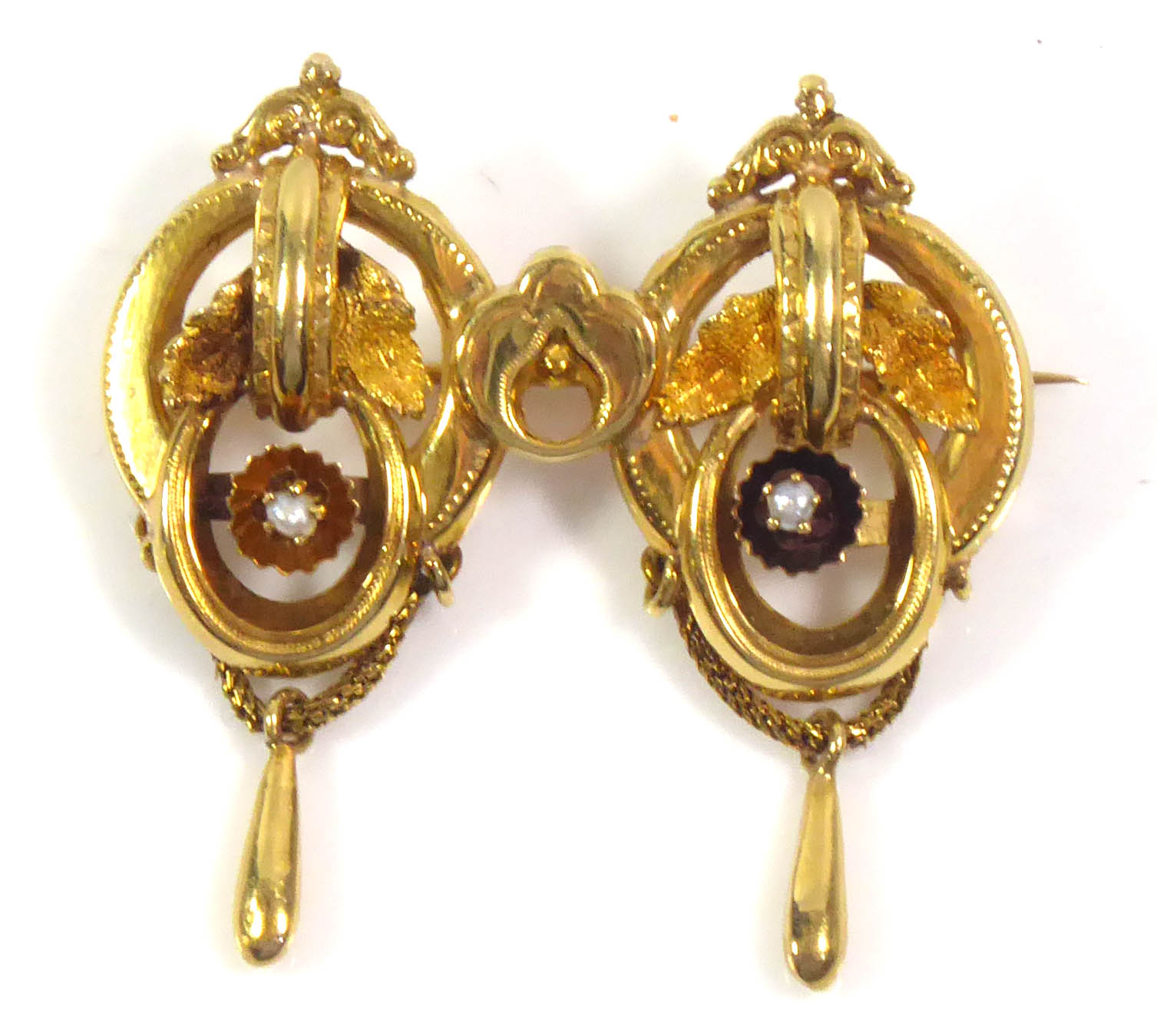 A 19TH CENTURY ETRUSCAN DESIGN YELLOW METAL AND SEED PEARL BROOCH With a single seed pearl and