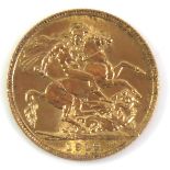 AN EARLY 20TH CENTURY 22CT GOLD FULL SOVEREIGN COIN, DATED 1912 Bearing portrait of King George V