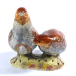 BESWICK, A 20TH CENTURY CERAMIC GROUP, PAIR OF PARTRIDGES Raised on a naturalistic base and having a