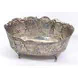 A 19TH CENTURY DUTCH SILVER BOWL Embossed with a Rococo landscape, bearing a fleur de lis mark to