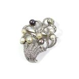AN 18CT WHITE GOLD, DIAMOND AND NATURAL PEARL BROOCH Having an arrangement of round cut diamonds,