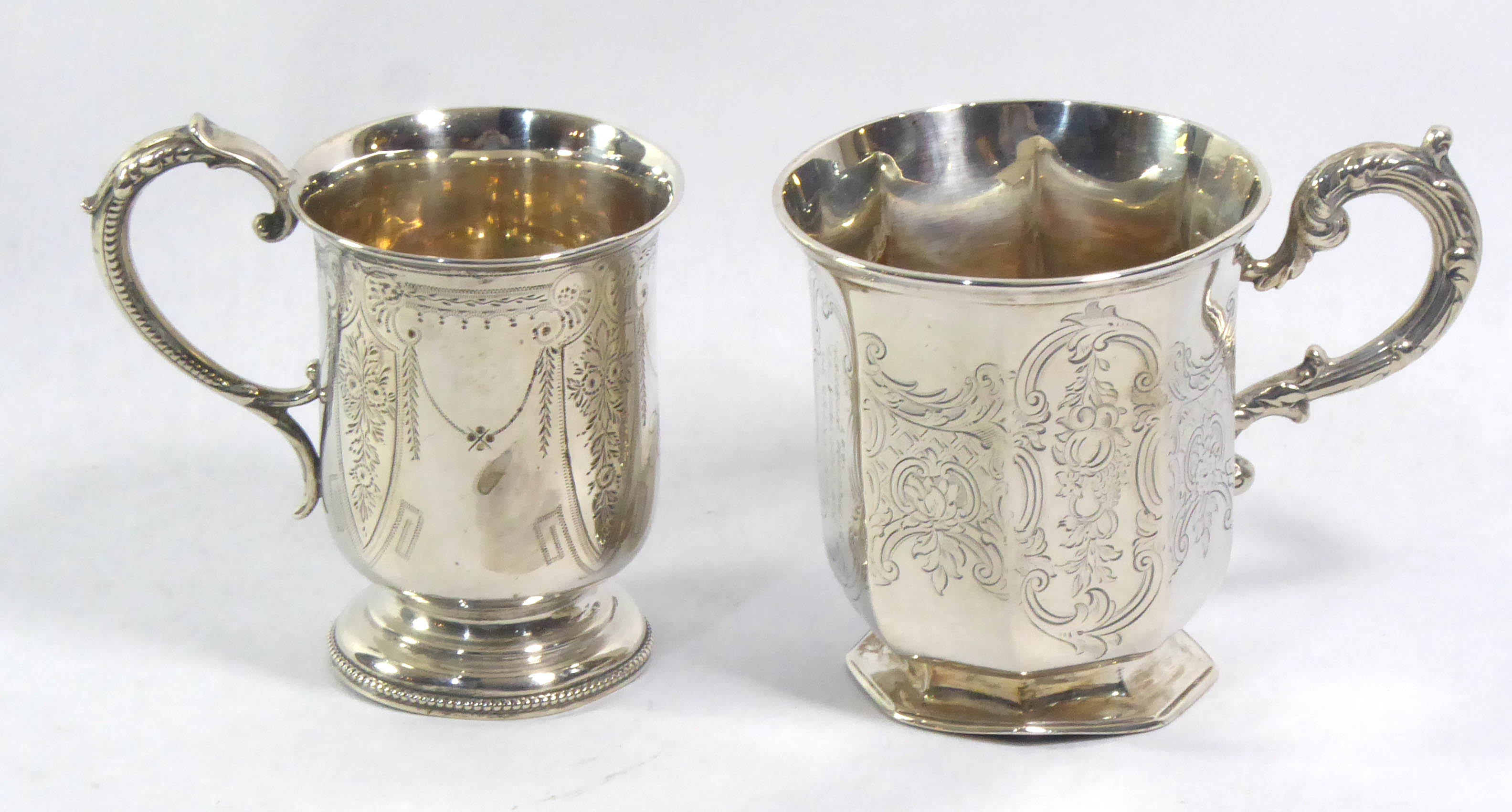 TWO VICTORIAN SILVER CHRISTENING MUGS Of chamfered form with engraved cartouches, inscribed ?Tom