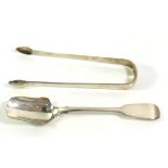 A PAIR OF GEORGIAN SILVER SUGAR TONGS Of plain form, hallmarked London, IB, 180, together with a