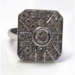 AN 18CT WHITE GOLD AND DIAMOND ?UNION FLAG? RING The arrangement of round cut diamonds forming a