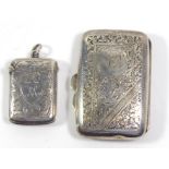 AN EARLY 20TH CENTURY SILVER RECTANGULAR CIGARETTE CASE With engraved scrolled decoration,