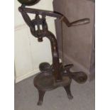 A 19TH CENTURY FRENCH IRON BOTTLE CORK PRESS. (75cm)