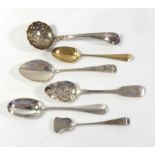 A COLLECTION OF GEORGIAN AND LATER SILVER SPOONS Comprising a silver gilt shell back teaspoon, by