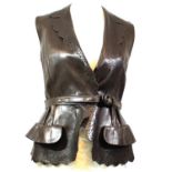 CHRISTIAN DIOR, BROWN LEATHER WAISTCOAT With cutout design along front and hem, shawl lapel