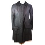 ROCHAS, BLACK WOOL COAT With black sphere buttons along the front, net along hemline and cuffs,