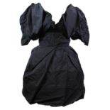 VIVIENNE WESTWOOD, BLACK COTTON DRESS With hoop skirt, puffed sleeves, V neckline and embroidered