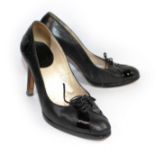 CHRISTIAN DIOR, BLACK SNAKE SKIN PATTERN HEELS With patent leather to laced front and number 2 badge