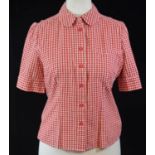 L'ÉCOLE DES FEMMES, TWO WHITE SHORT SLEEVED BUTTON DOWN With integral black tie, along with a red