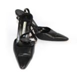 MANOLO BLAHNIK, BLACK LEATHER HEELS With a pointed toe, flat studded ankle strap (size 39). (heel