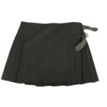 BURBERRY, BLACK WOOL SKIRT With pleated design and two side buckles (size 10). A