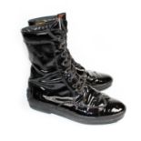 TOD'S, BLACK PATENT LEATHER LACE UP BOOTS With a rubber base, black embroidered design (size 39). (