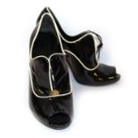 GUCCI, BLACK PATENT LEATHER ANKLE BOOTS Peep toe design with white trim to edges and white metal
